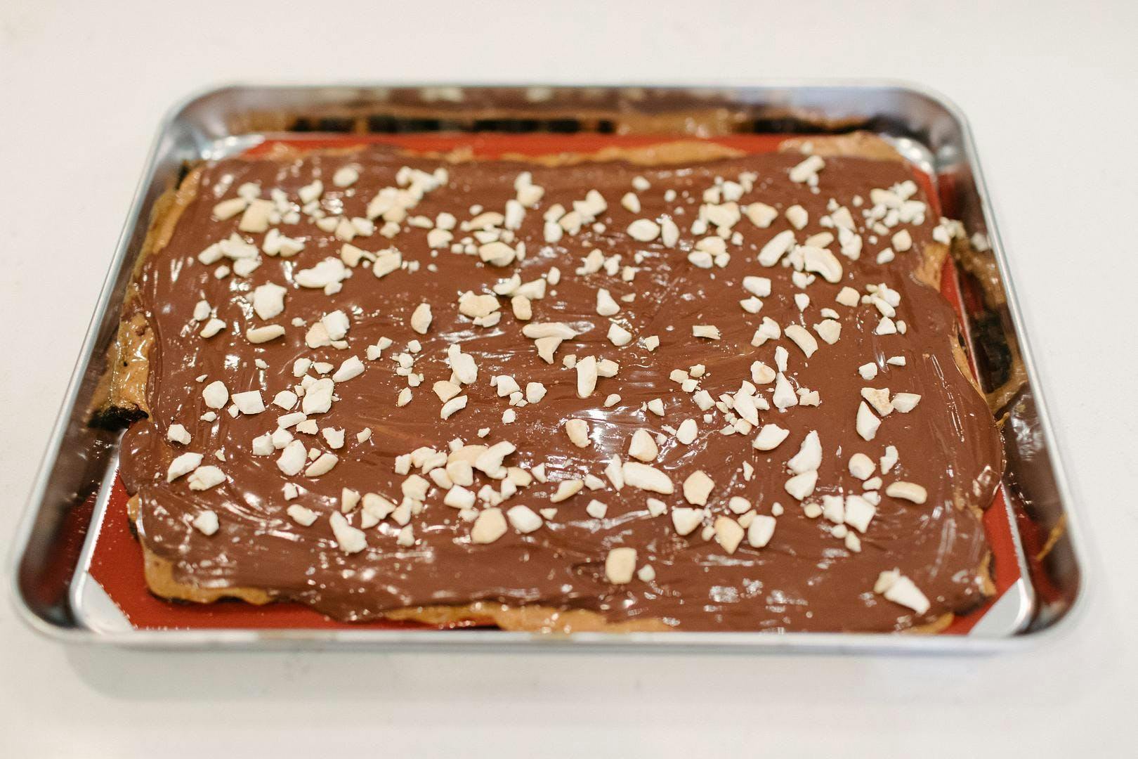 date bars with nuts sprinkled over top