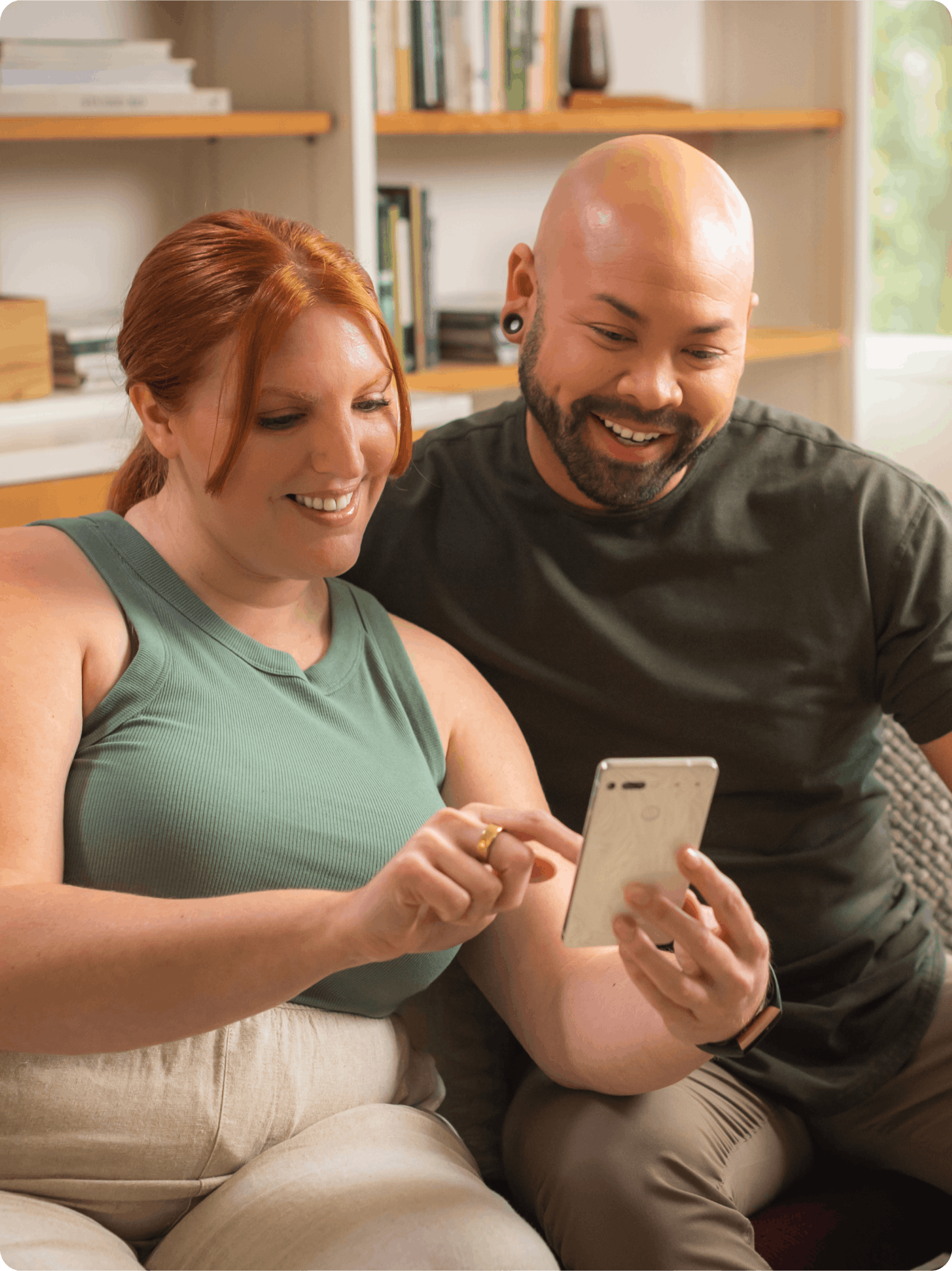 Woman showing husband blood glucose on veri app