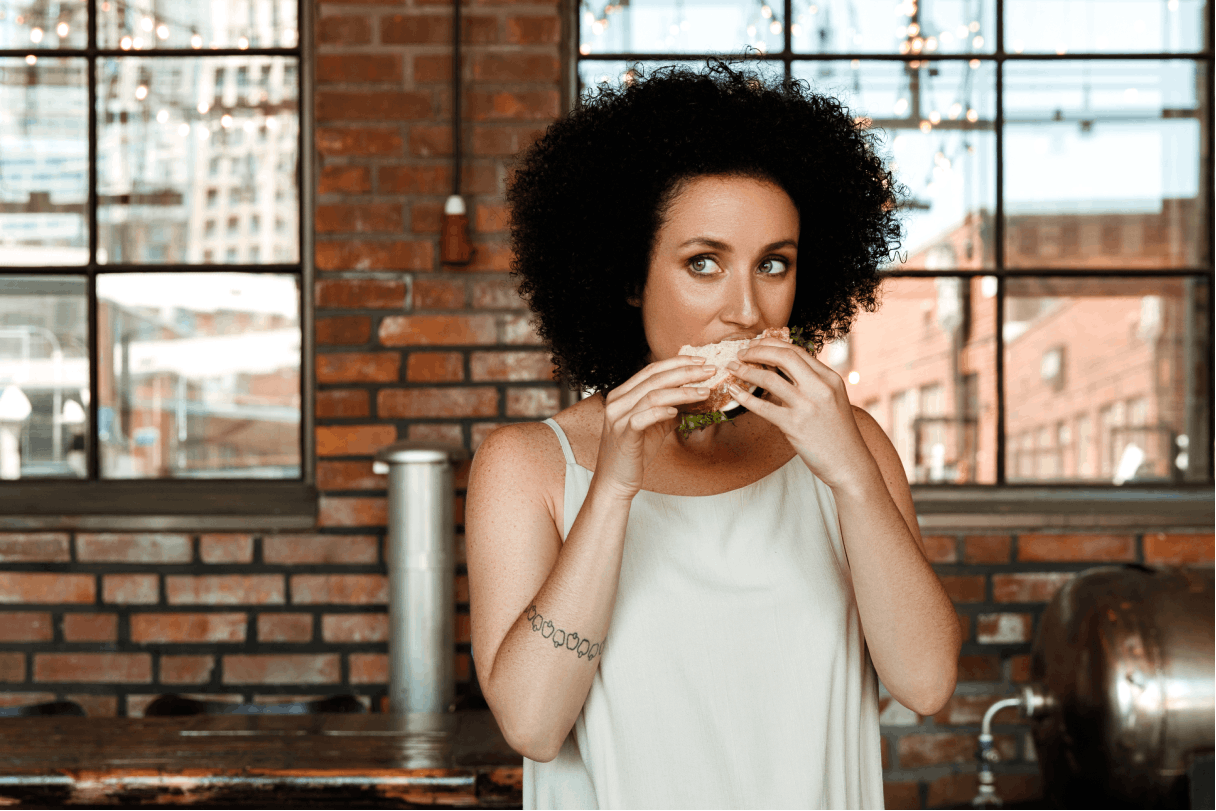 person eating sandwich 