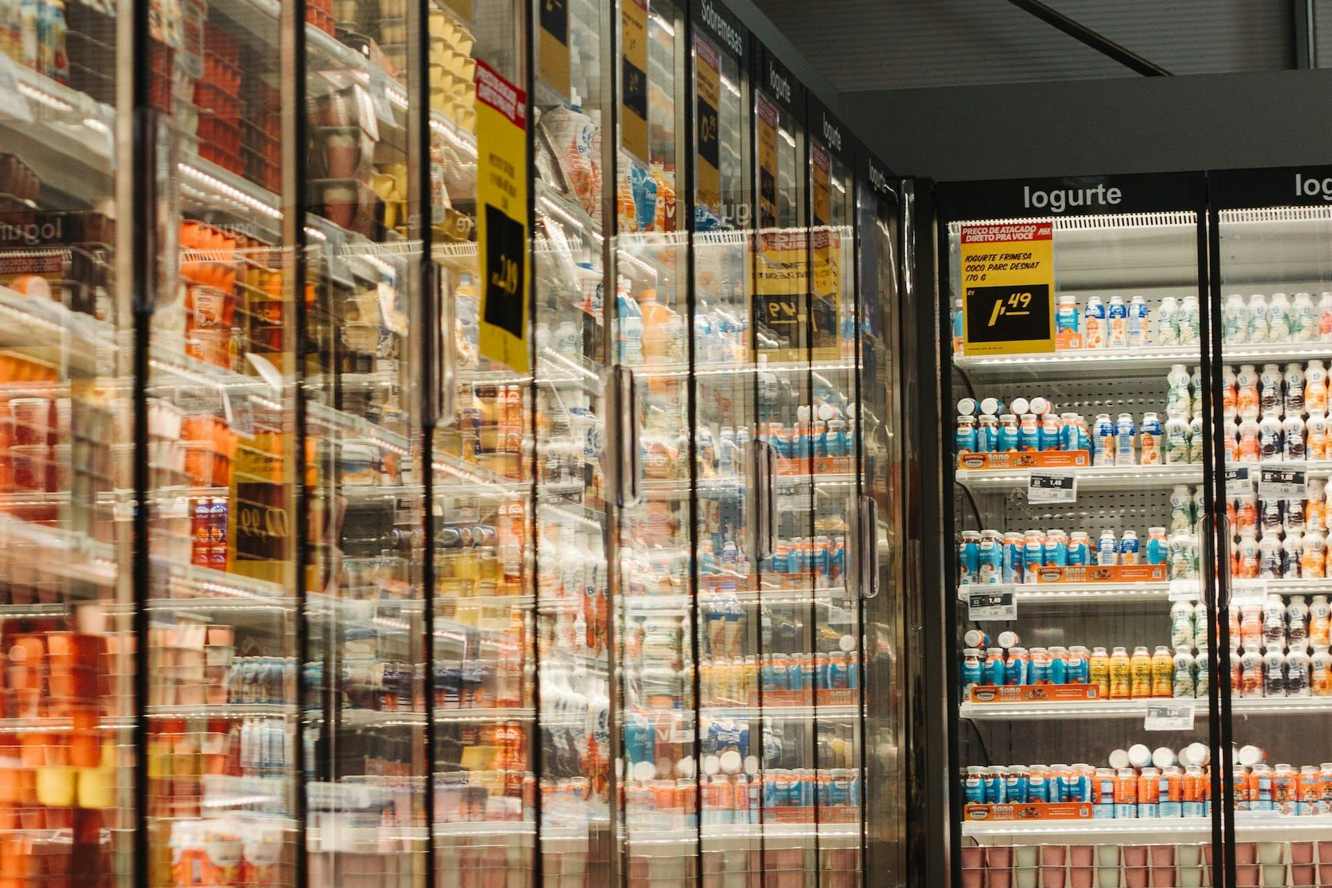 supermarket refrigerators with processed drinks and snacks